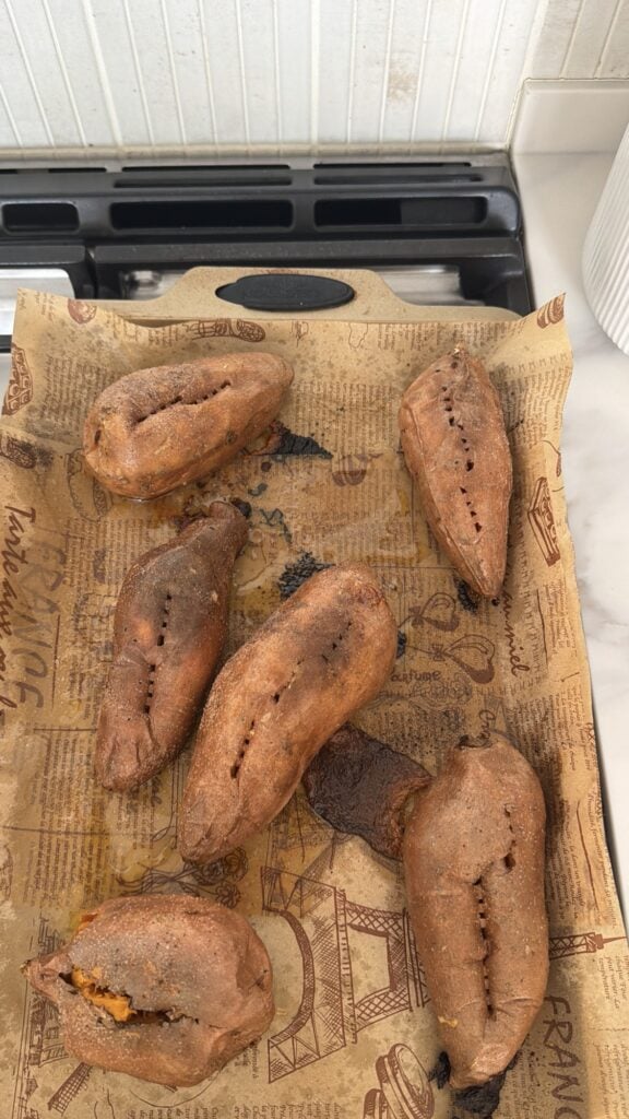 Baked sweet potatoes that have been checked with a fork to see if it they're tender