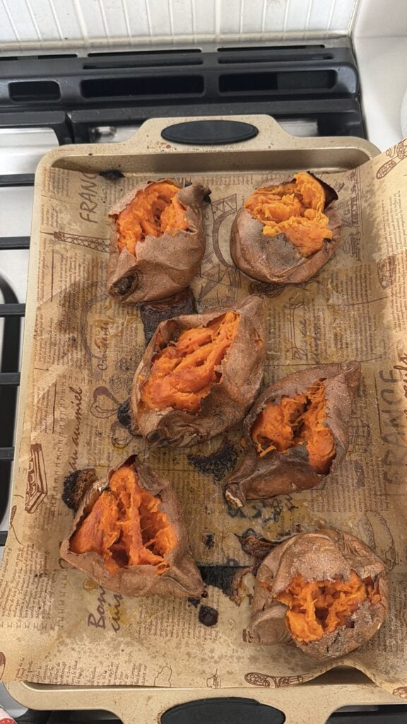 Split, make ahead baked sweet potatoes ready to reheat for Thanksgiving