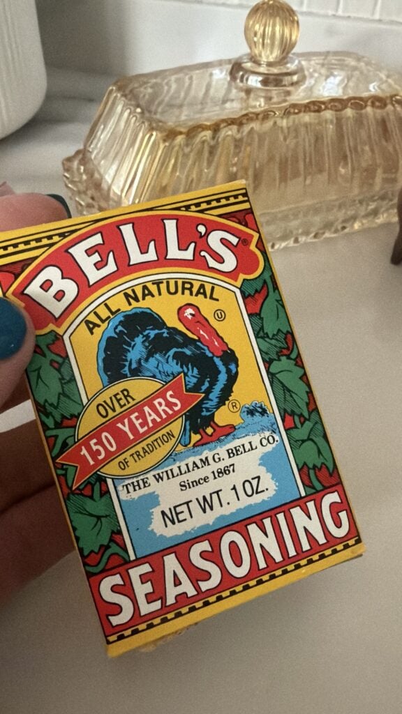 Box of Bell’s poultry seasoning used to make homemade holiday stuffing.