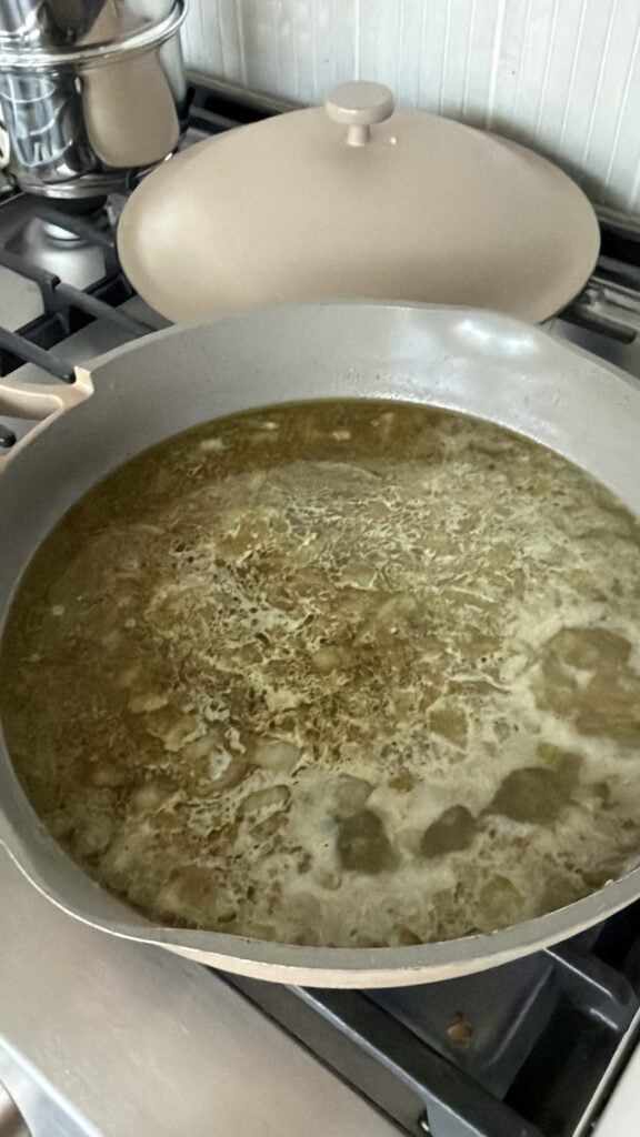 Chicken broth simmering with butter celery onions and Bell’s Seasoning for stuffing.