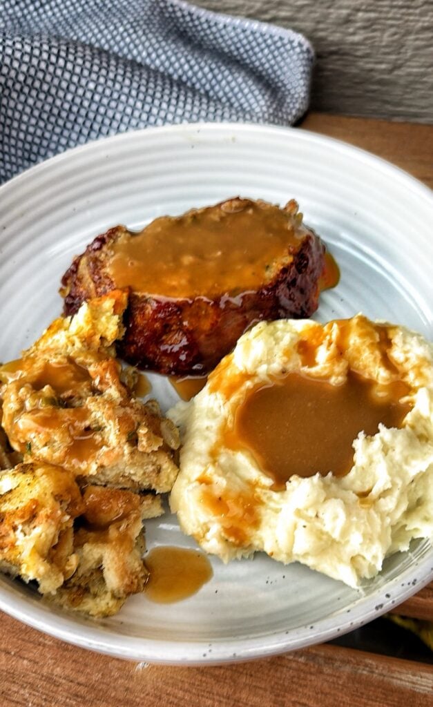 Thanksgiving Turkey Meatloaf with stuffing, mashed potatoes, and gravy