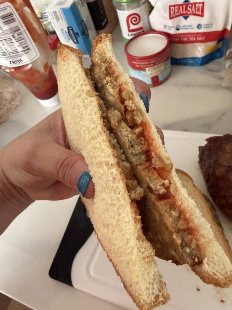Leftover Thanksgiving turkey meatloaf sandwich with cranberry sauce and turkey gravy.