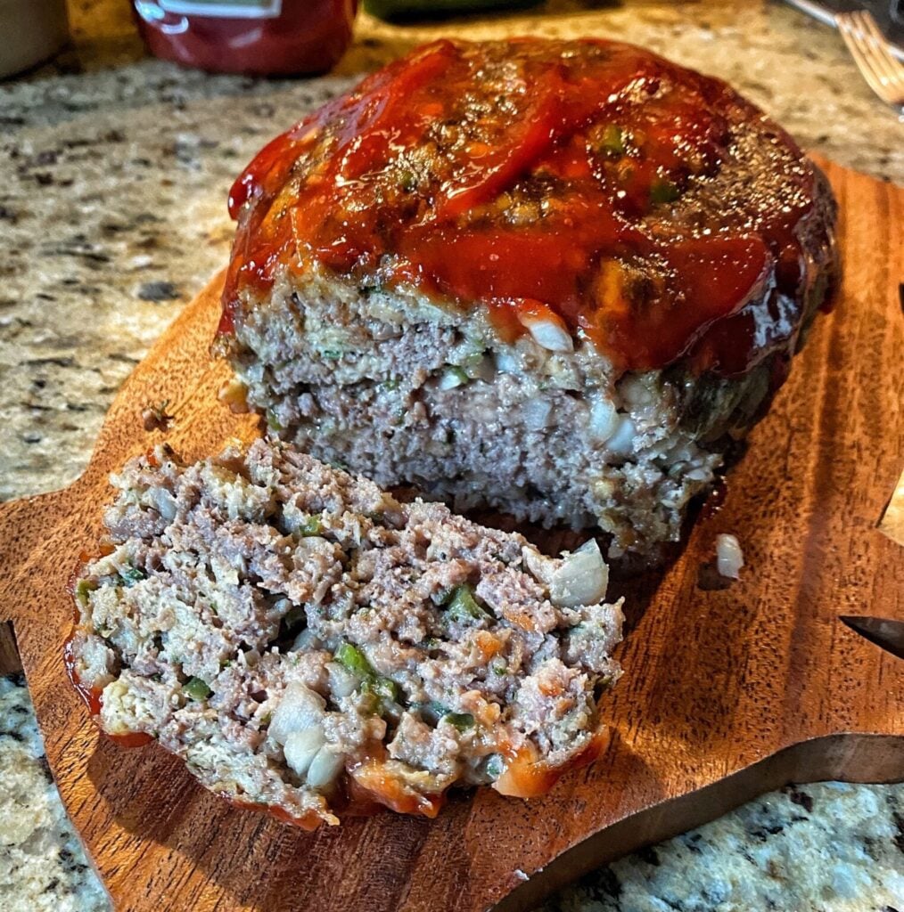 a classic meatloaf with a ketchup glaze shown sliced