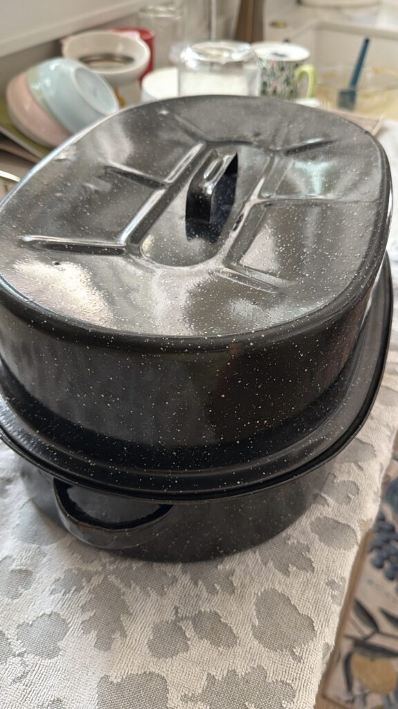 Vintage black speckled covered roaster used for Steakhouse Onion Pot Roast