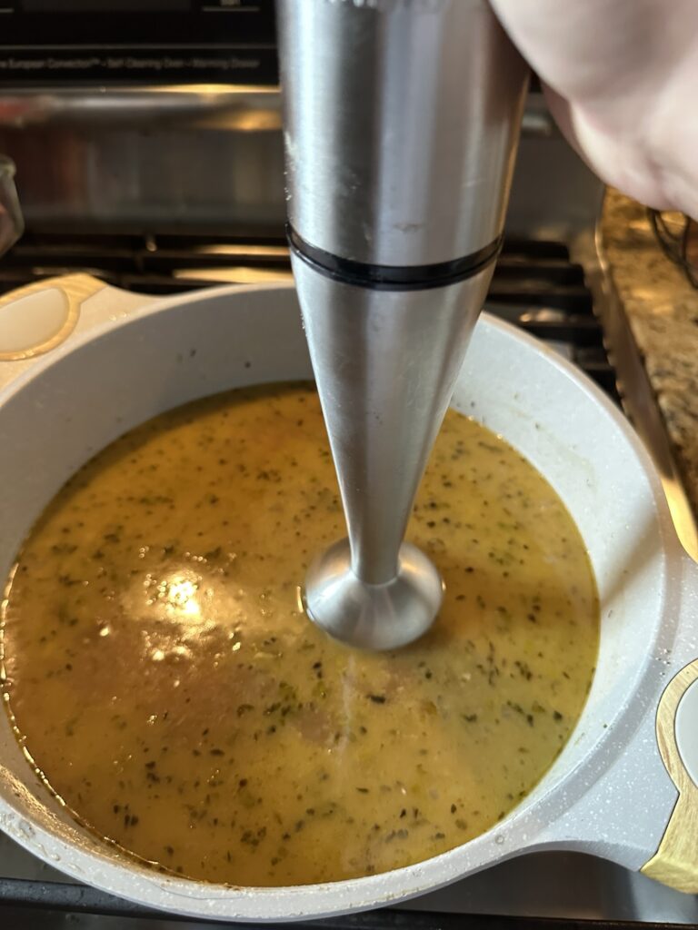 Turkey Gravy with roasted turkey celery and onion before thickening
