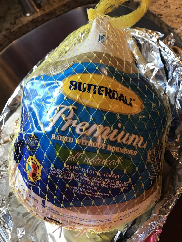 Whole turkey in package ready to prepare for Thanksgiving dinner
