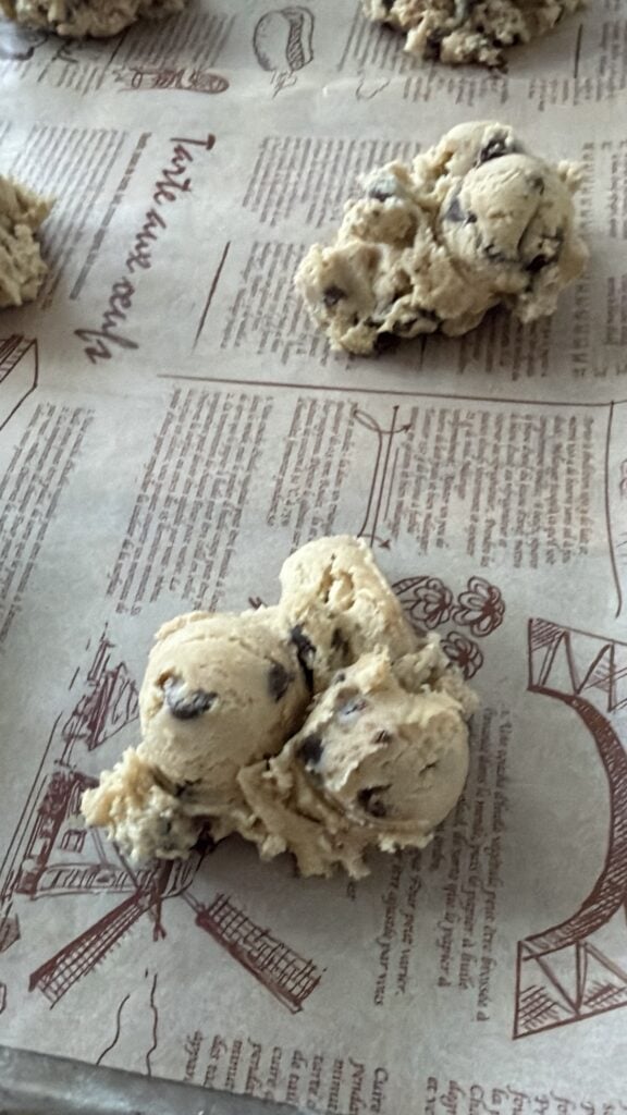 Jumbo chocolate chip cookie dough balls frozen ahead for football team dinners and game day baking.