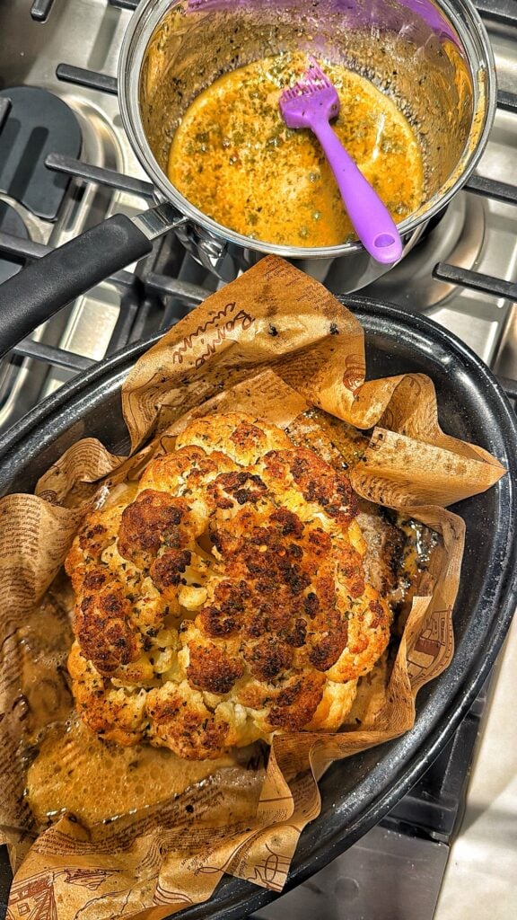 Whole roasted cauliflower brushed with lemon anchovy butter