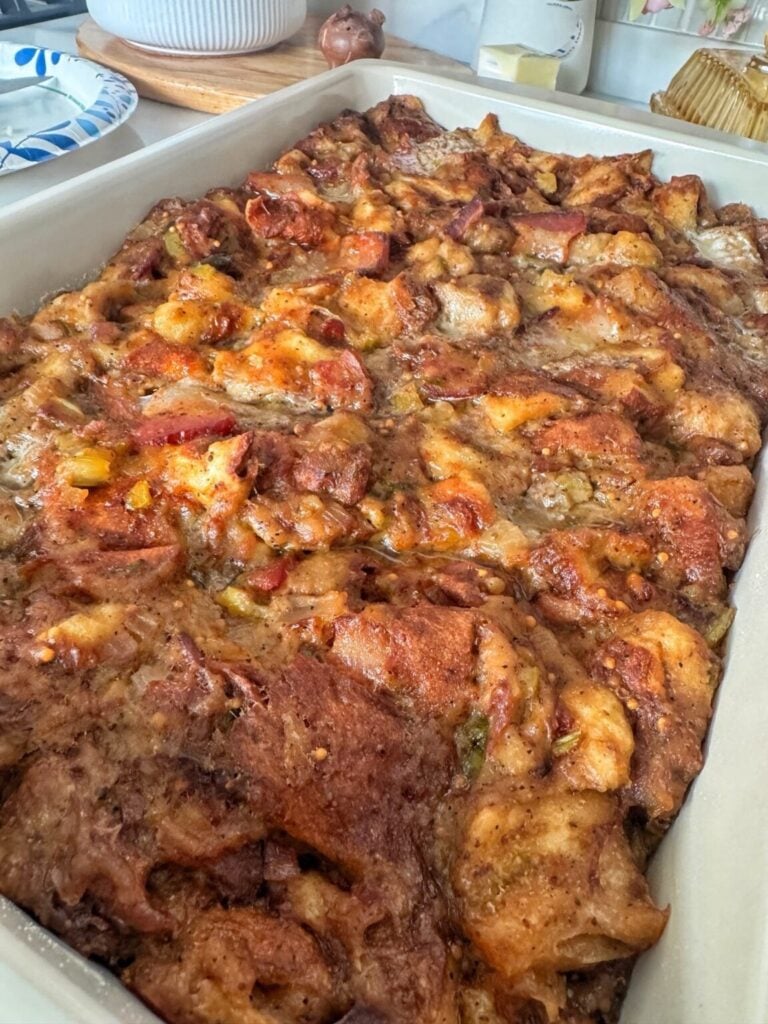 a pan of ham stuffing made with hawaiian rolls