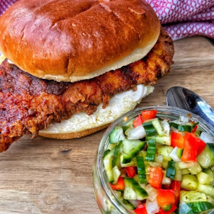 Chicago hot chicken sandwich with cucumber red pepper relish and toasted bun