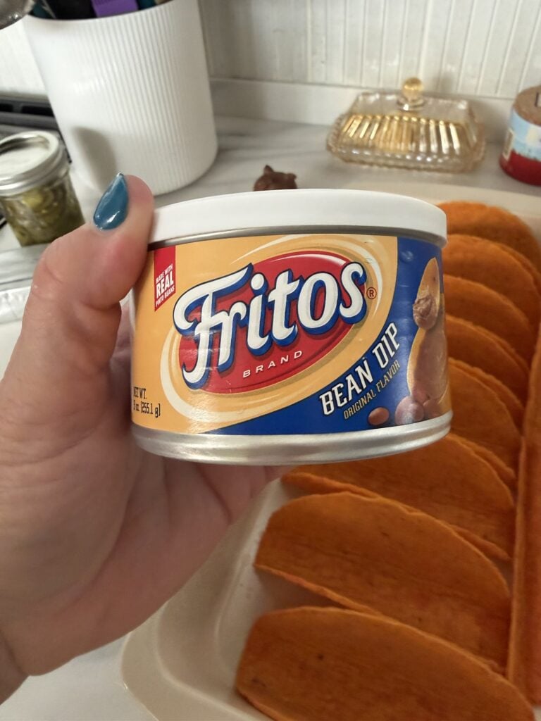 Smooth canned bean dip from the chip aisle for Halloween Taco Dip