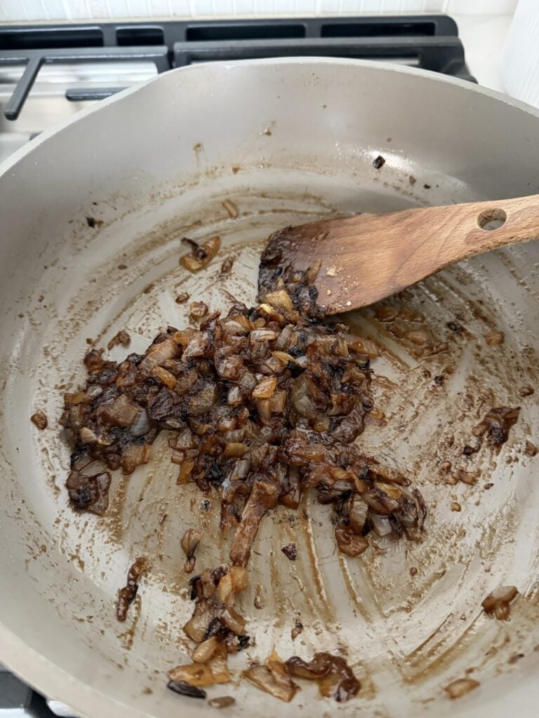 Vidalia onions caramelized in butter until soft, sweet, and golden brown for ham and cheese sliders.