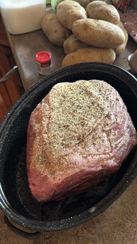 Pork shoulder seasoned with caraway seeds, garlic powder, onion powder, salt, pepper, and sugar.