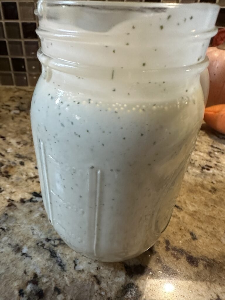 Homemade Creamy Aloha Dressing stored in a glass jar