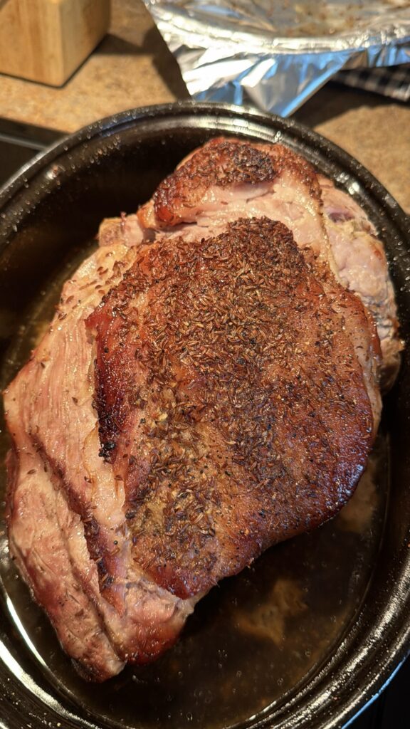Mom’s Pork Roast served with gravy for an old-fashioned family dinner.