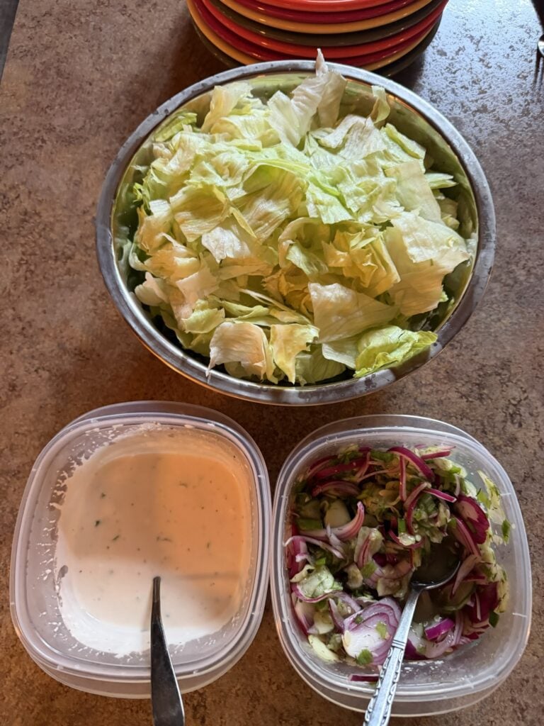 The components of the salad separated before serving