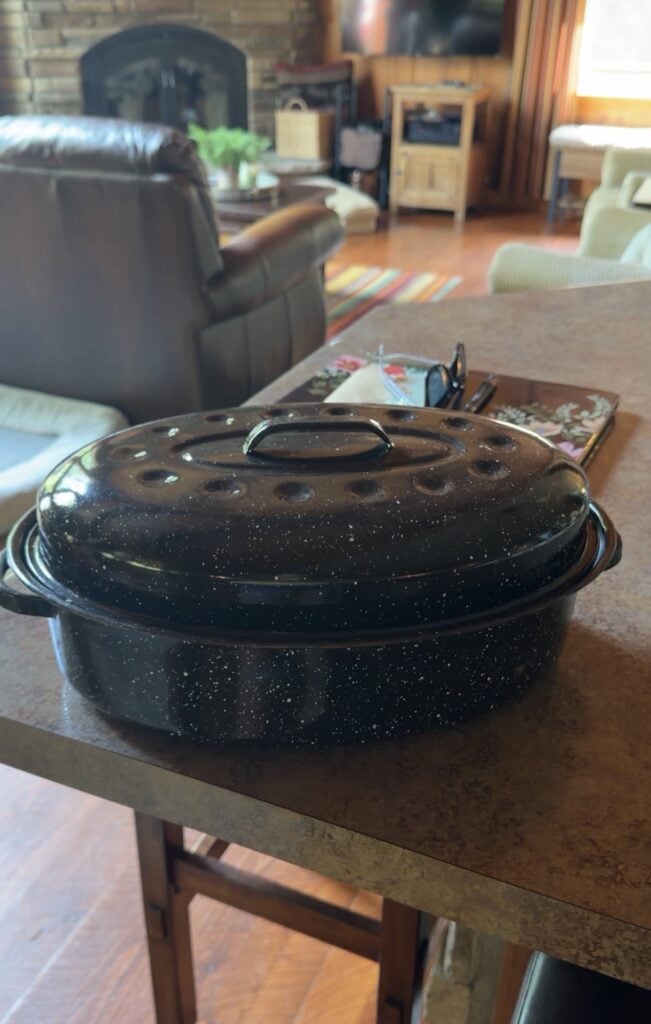 Black and white speckled covered roasting pan used for Mom’s Pork Roast.