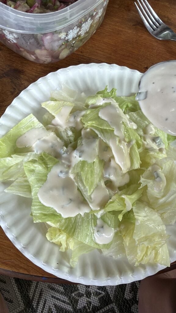 Crisp iceberg lettuce covered with sweet and tangy creamy dressing