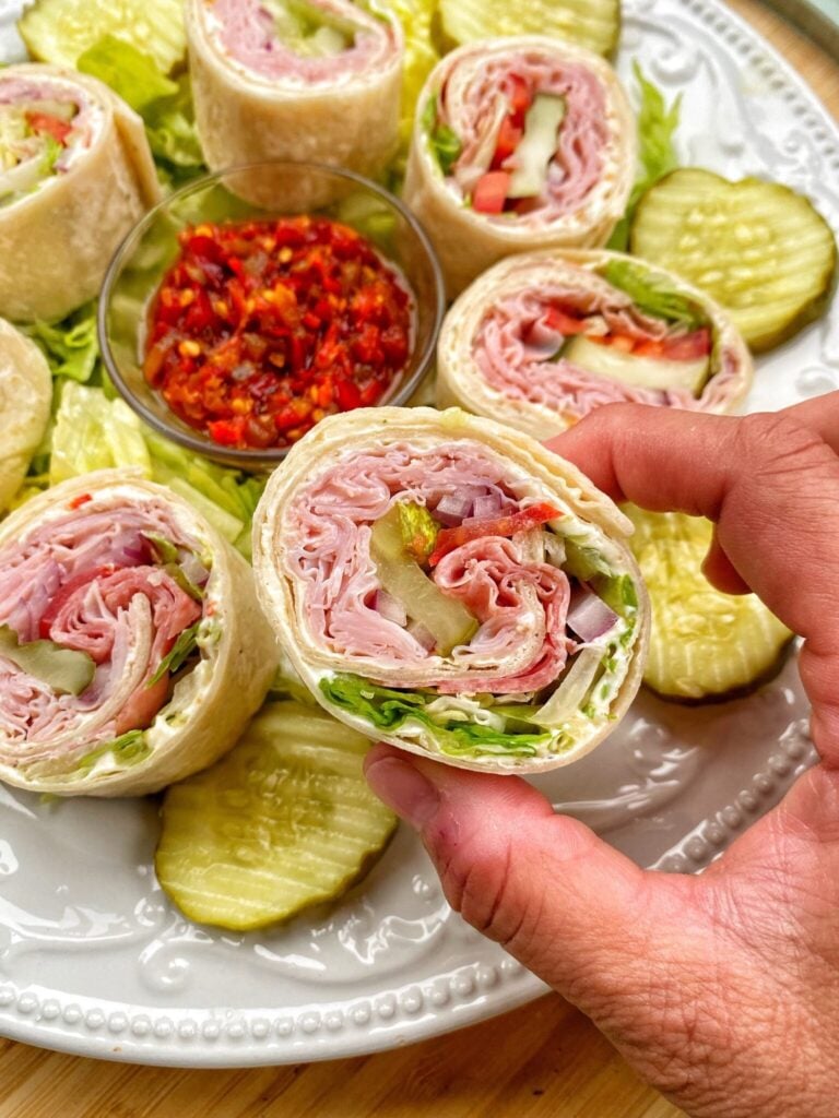 tortilla rolled up sandwiches with ham and pickles