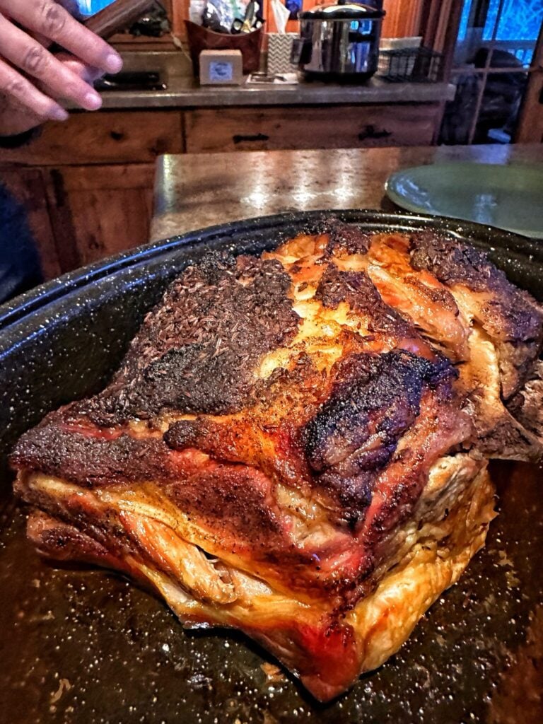 a pork shoulder roast with a seasoned cripsy crust