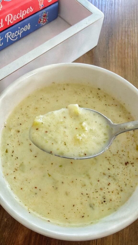 Homemade skillet cream of celery soup with celery, onions, milk and tarragon.
