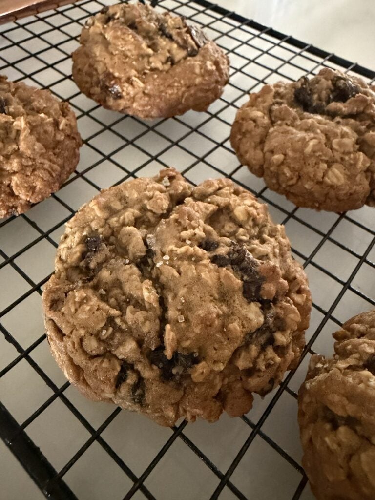 Freshly baked oatmeal raisin cookies with golden edges and soft centers