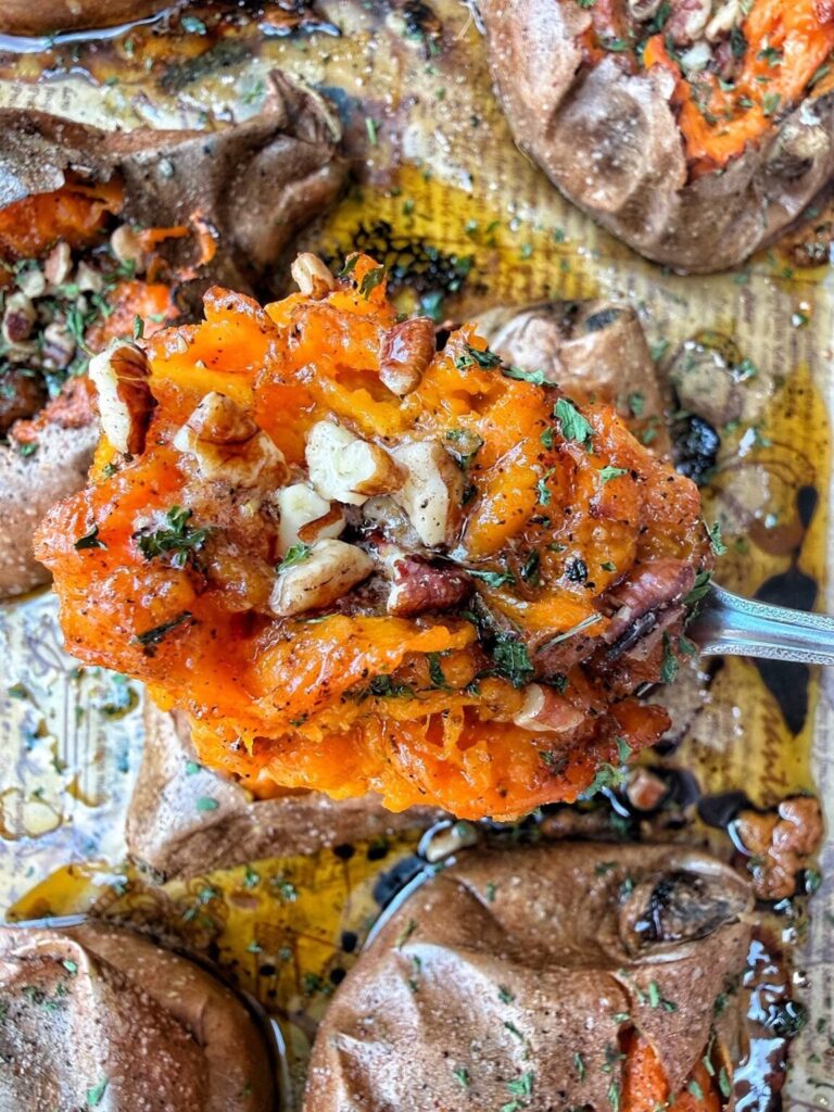 baked sweet potatoes with butter and pecans