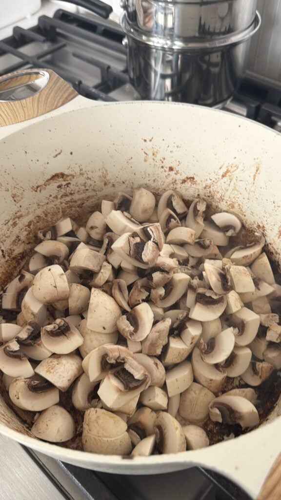 diced white mushrooms in the pot