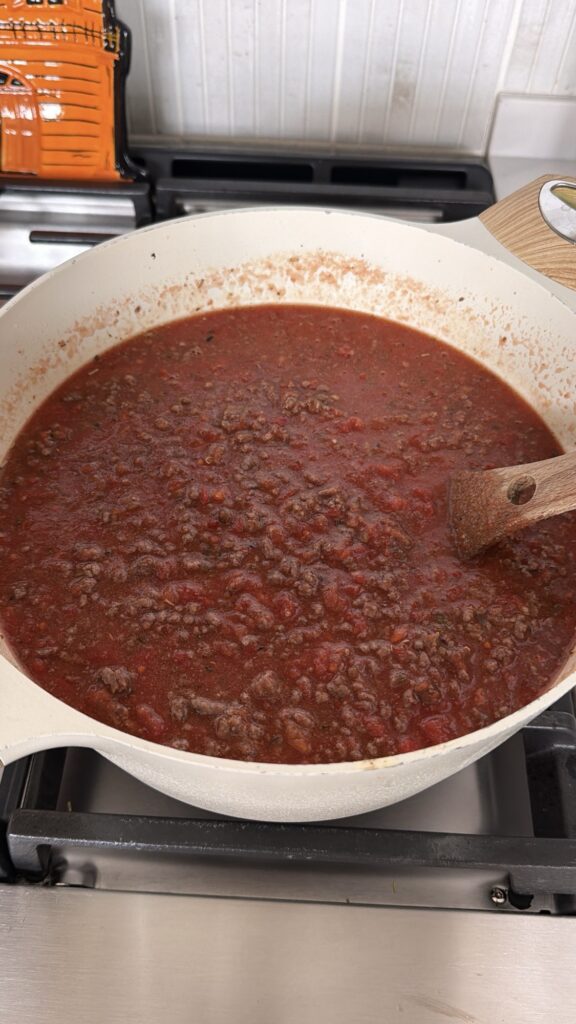 Chicago style tomato meat sauce simmering with finely crumbled ground beef.