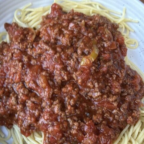 Spaghetti topped with Chicago style ground beef meat sauce.
