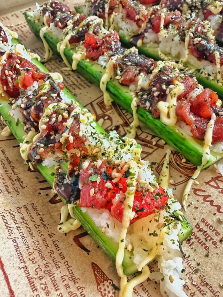 Cucumber boats with the sushi and all the toppings
