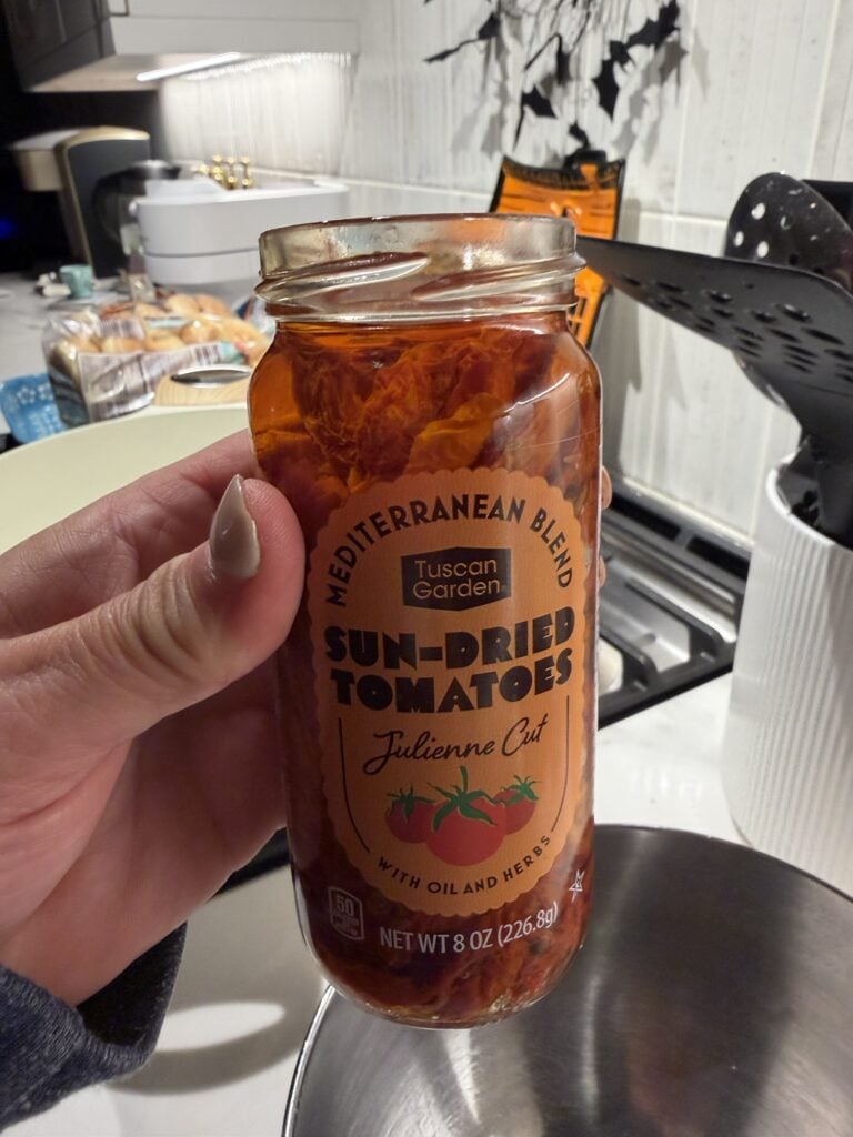A jar of sun dried tomatoes in oil