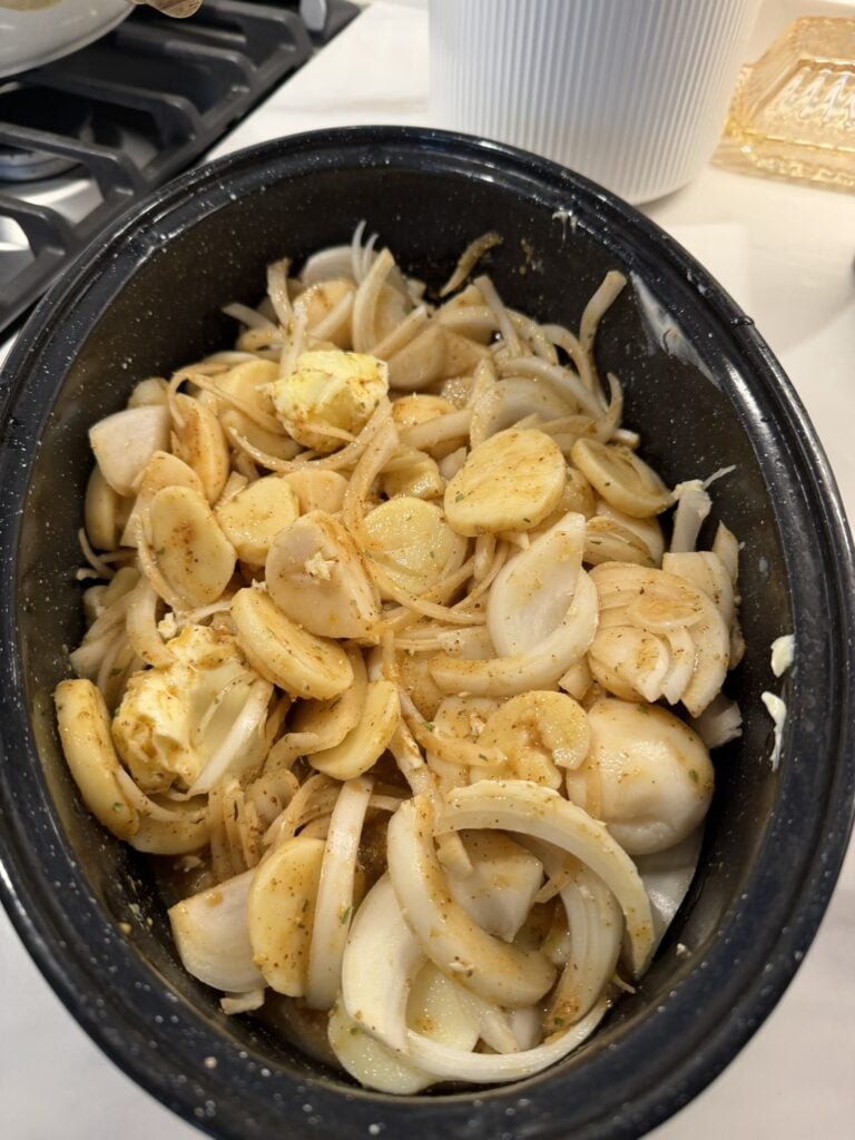Canned potatoes and thinly sliced onions coated in Dijon mustard broth.