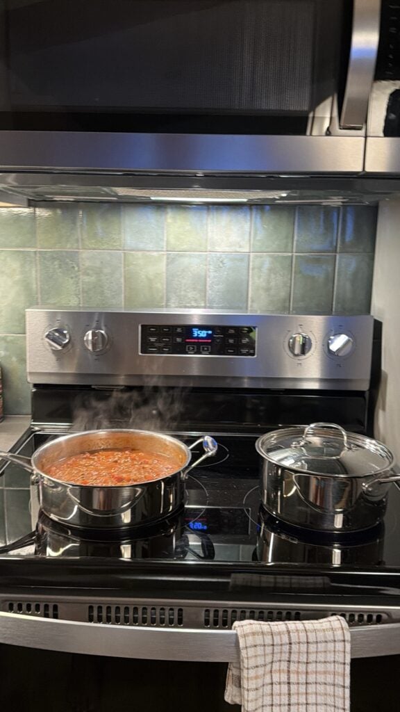 Sauce and Pasta Simmering On The Stove
