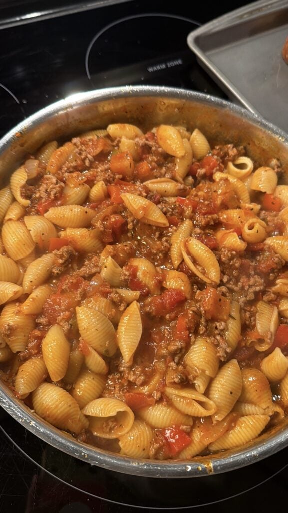 beef, vegetables, pasta, simmering in the sauce