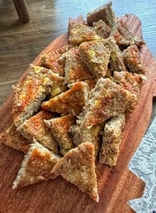 Sheet pan sausages cut into triangles